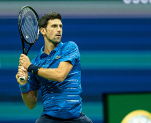 Ruthless Djokovic crushes Rublev to reach last four in Turin
