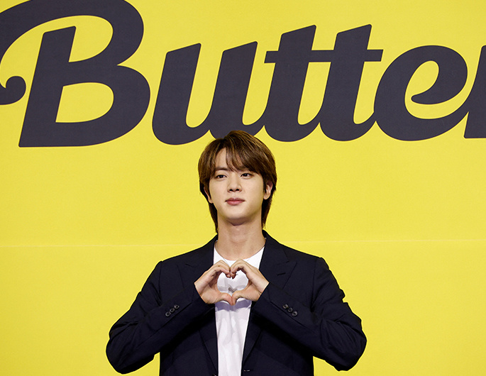 BTS star Jin begins South Korea army duty amid tight security, cheering fans